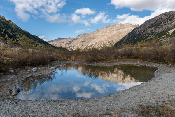 Piz Albris gespiegelt in einem kleinen Bergsee